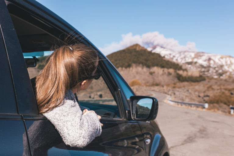 sticking-her-head-out-to-see-the-volcano