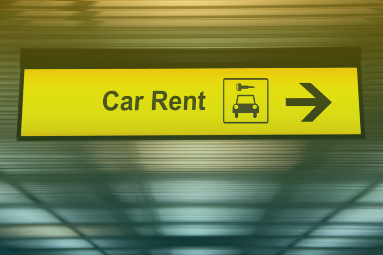 sign-with-arrow-point-to-rent-a-car-service-at-the-airport-for-passenger-who-want-to-hide-a-car-for-travel-around-city-freedom-transportation-for-convenient-travel